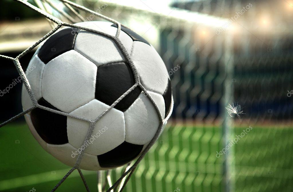 depositphotos_9246448-stock-photo-football-the-ball-flies-into