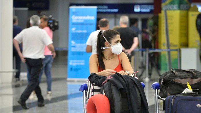 Pasajera-aeropuerto-696x392